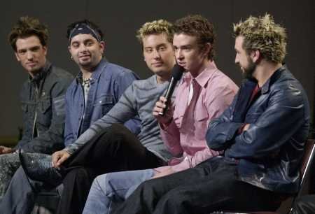 The guys talking. hehe, I don't know what about.